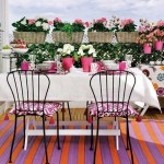 Balcón jardín tonos rosas